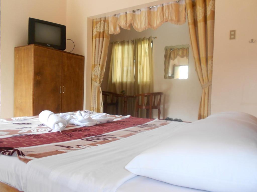 Tia Mers Guest House Puerto Princesa Zimmer foto